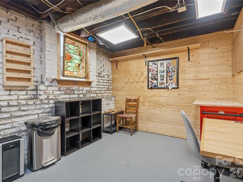 502 Ridge Avenue, Kannapolis, NC 28083.  MLS# CAR4390165, YatesRealty ID 30543. Basement Office/Work area