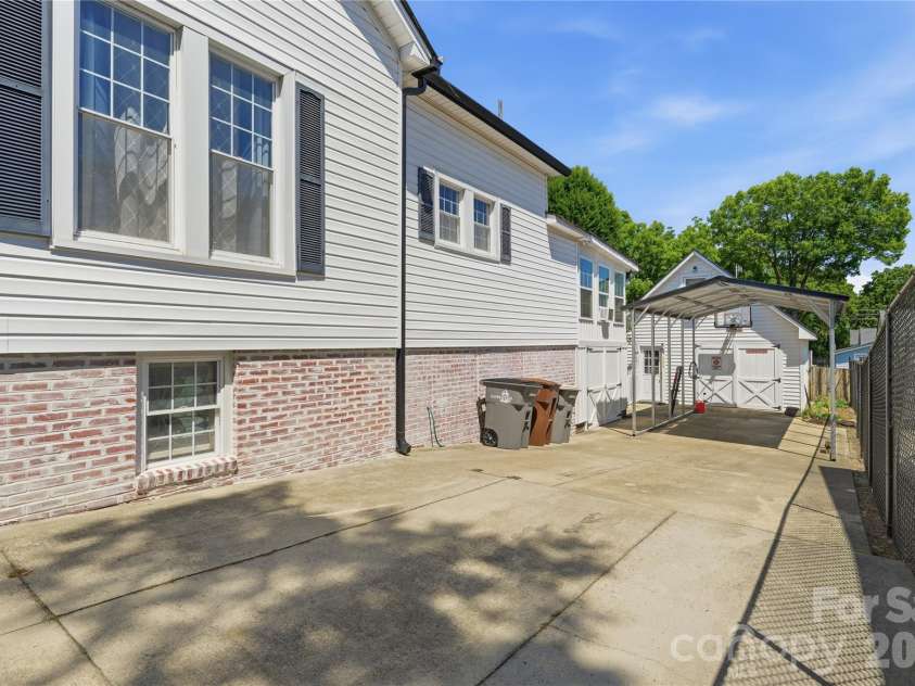 502 Ridge Avenue, Kannapolis, NC 28083.  MLS# CAR4390165, YatesRealty ID 30543. Driveway to Detached Garage