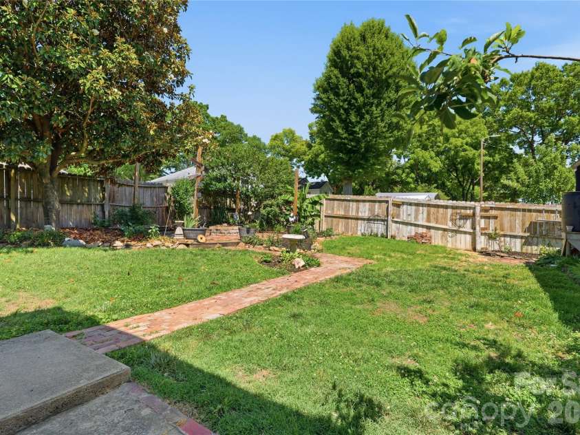 502 Ridge Avenue, Kannapolis, NC 28083.  MLS# CAR4390165, YatesRealty ID 30543. Private Backyard