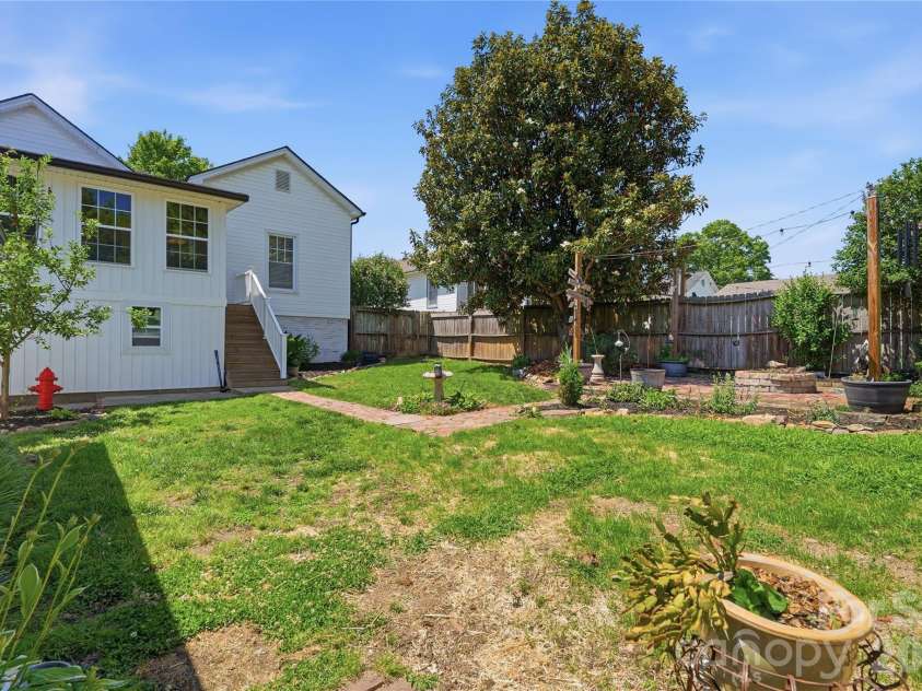 502 Ridge Avenue, Kannapolis, NC 28083.  MLS# CAR4390165, YatesRealty ID 30543. Private Backyard
