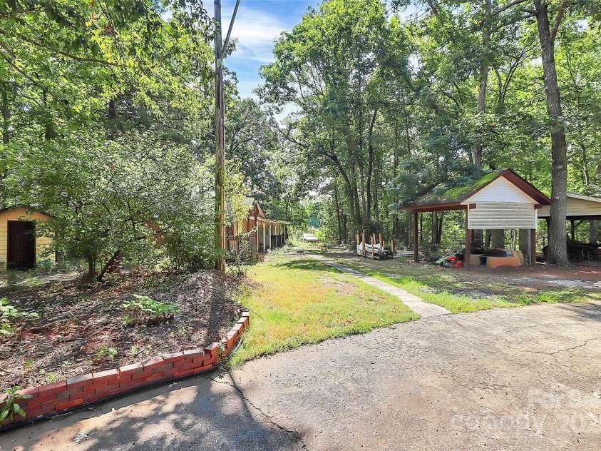 1940 Rock Hill Church Road, Matthews, NC 28104.  MLS# CAR4275289, YatesRealty ID 30547. 
