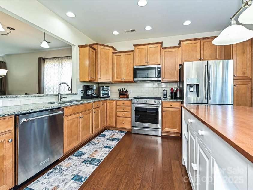 8024 Carolina Lakes Way, Fort Mill, SC 29707.  MLS# CAR4215671, YatesRealty ID 30555. Kitchen from Sunroom