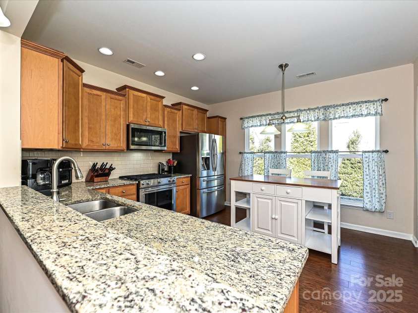 8024 Carolina Lakes Way, Fort Mill, SC 29707.  MLS# CAR4215671, YatesRealty ID 30555. Kitchen with stainless steel appliances