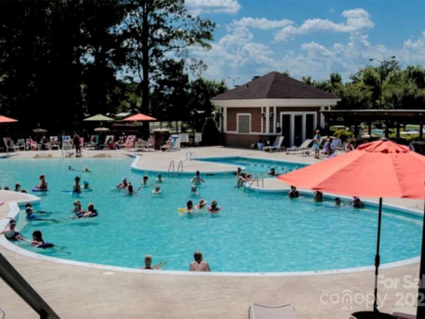 8024 Carolina Lakes Way, Fort Mill, SC 29707.  MLS# CAR4215671, YatesRealty ID 30555. Lake House Pool
