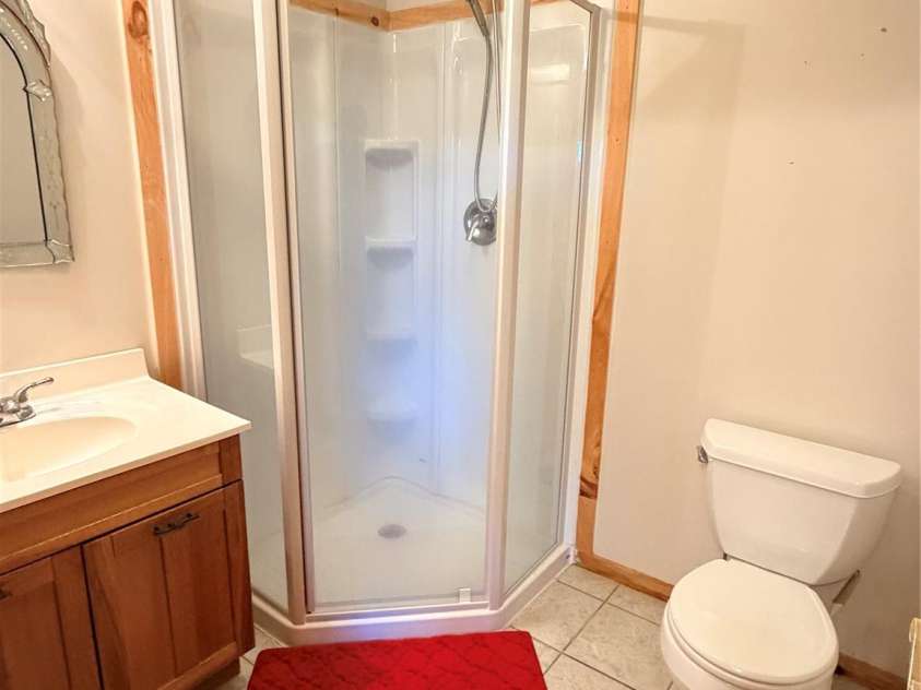 605 Valley View Drive, Purlear, NC 28665.  MLS# CAR4393524, YatesRealty ID 30559. Guest Bedroom Ensuite Bathroom