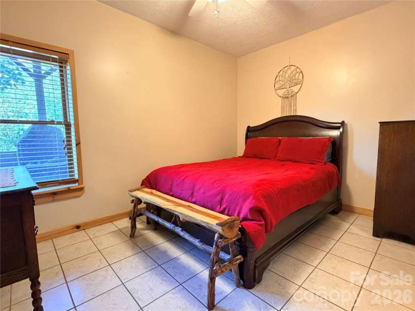605 Valley View Drive, Purlear, NC 28665.  MLS# CAR4393524, YatesRealty ID 30559. Guest Bedroom with Ensuite Bathroom