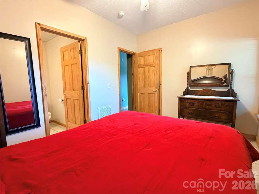 605 Valley View Drive, Purlear, NC 28665.  MLS# CAR4393524, YatesRealty ID 30559. Guest Bedroom with Ensuite Bathroom