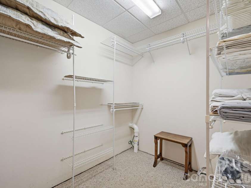 605 Valley View Drive, Purlear, NC 28665.  MLS# CAR4393524, YatesRealty ID 30559. Walk-In Closet in Primary Ensuite Bathroom