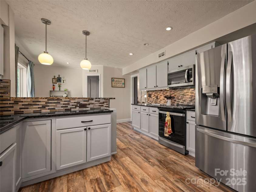 4 Daniel Drive, Fletcher, NC 28732.  MLS# CAR4312406, YatesRealty ID 3056. 