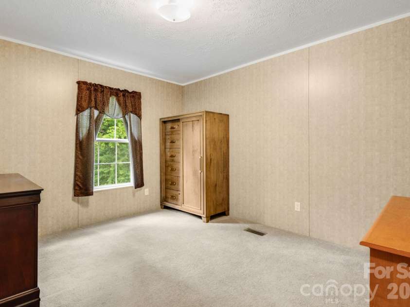 77 Star Flower Road, Alexander, NC 28701.  MLS# CAR4393354, YatesRealty ID 30573. 
