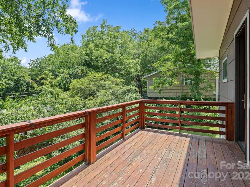 50 Greeley Street, Asheville, NC 28806.  MLS# CAR4278819, YatesRealty ID 30574. Balcony deck off kitchen