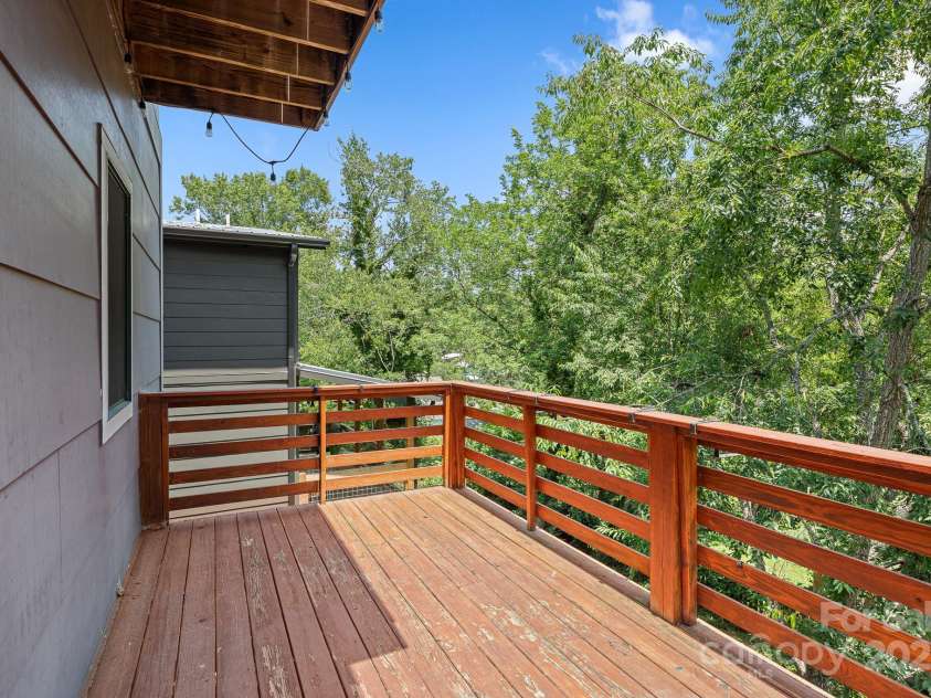 50 Greeley Street, Asheville, NC 28806.  MLS# CAR4278819, YatesRealty ID 30574. Balcony deck off kitchen