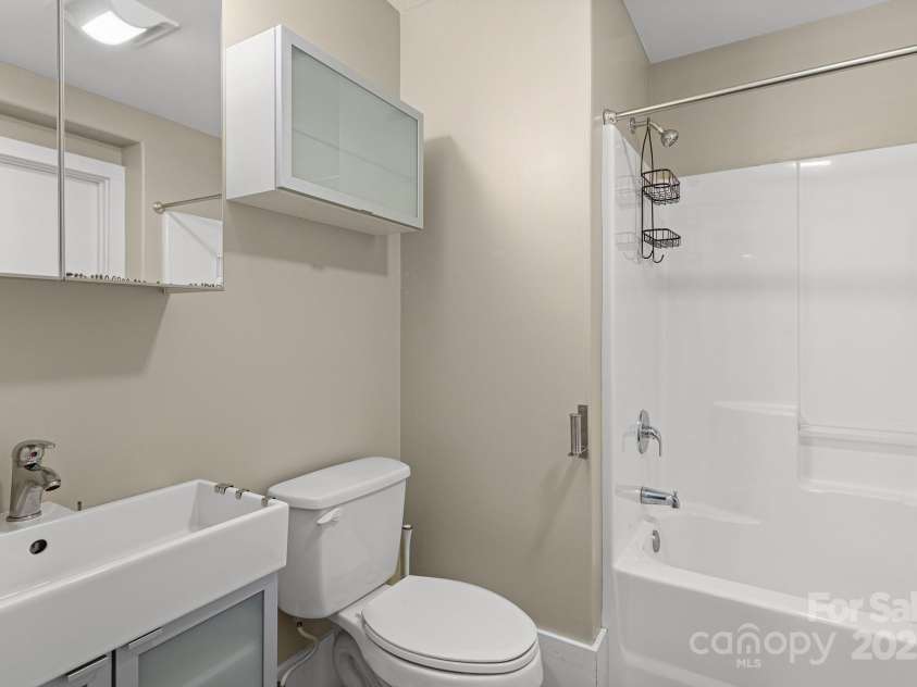 50 Greeley Street, Asheville, NC 28806.  MLS# CAR4278819, YatesRealty ID 30574. Basement apartment full bathroom