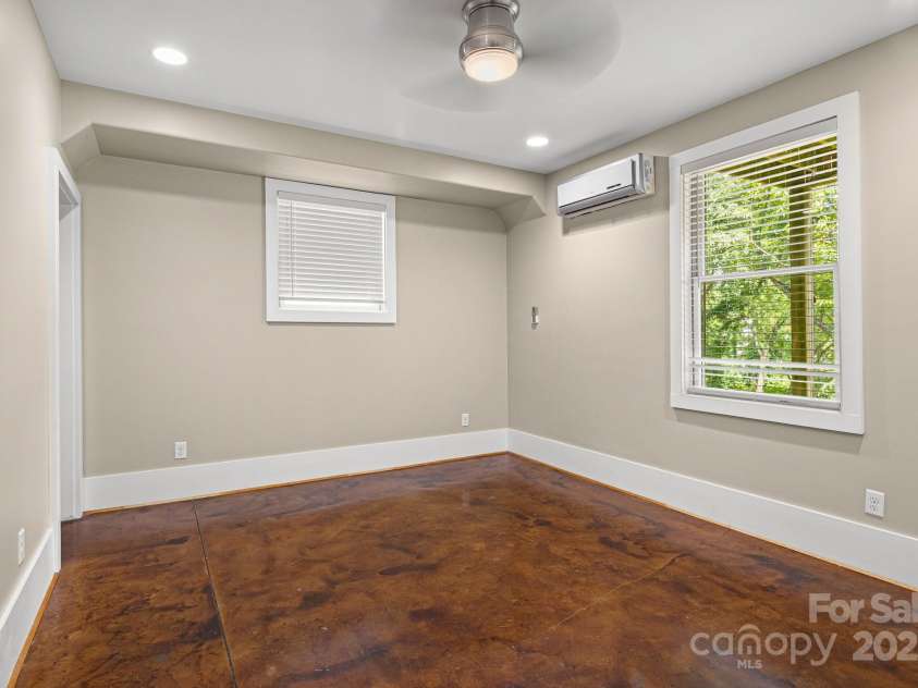 50 Greeley Street, Asheville, NC 28806.  MLS# CAR4278819, YatesRealty ID 30574. Basement bedroom