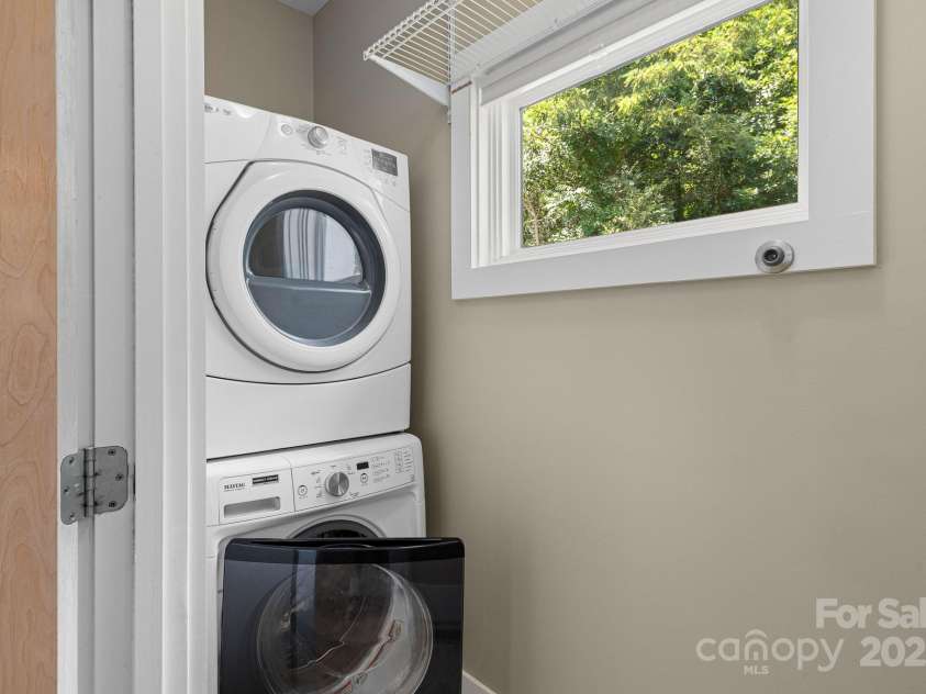 50 Greeley Street, Asheville, NC 28806.  MLS# CAR4278819, YatesRealty ID 30574. Laundry room off the dinning room
