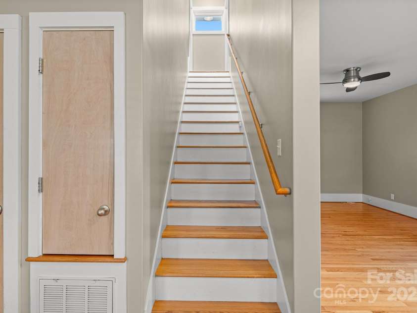 50 Greeley Street, Asheville, NC 28806.  MLS# CAR4278819, YatesRealty ID 30574. Stairs to 2nd level