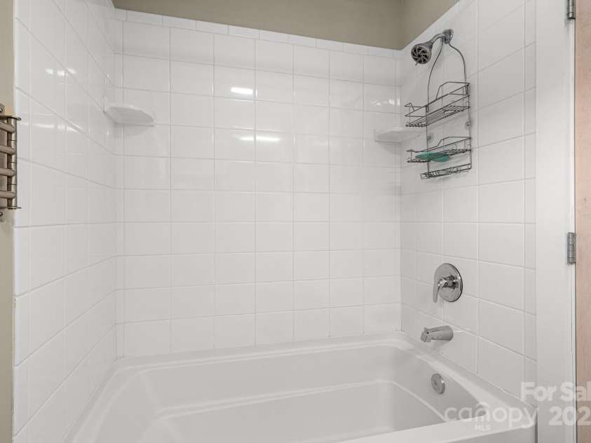 50 Greeley Street, Asheville, NC 28806.  MLS# CAR4278819, YatesRealty ID 30574. Upper bedroom full bathroom