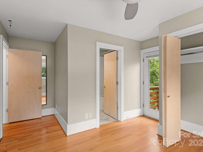 50 Greeley Street, Asheville, NC 28806.  MLS# CAR4278819, YatesRealty ID 30574. Upper bedroom with balcony deck