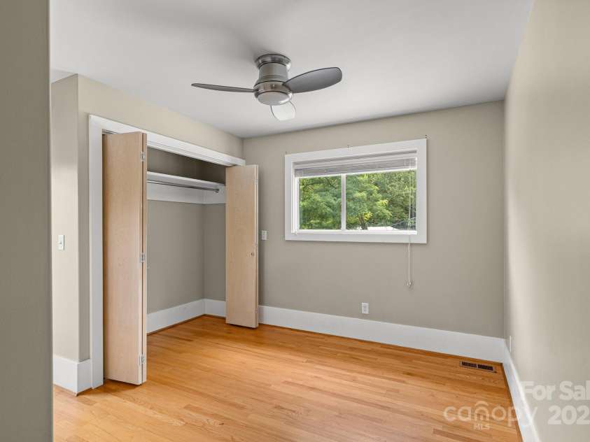 50 Greeley Street, Asheville, NC 28806.  MLS# CAR4278819, YatesRealty ID 30574. Upper bedroom with balcony deck