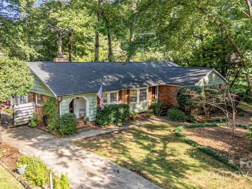 5811 Doncaster Drive, Charlotte, NC 28211.  MLS# CAR4281754, YatesRealty ID 30581. Bigger view of the Front Yard - deer will greet you :)
