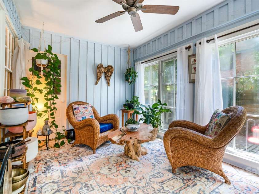 5811 Doncaster Drive, Charlotte, NC 28211.  MLS# CAR4281754, YatesRealty ID 30581. Delightful Sunroom - where birds visit often