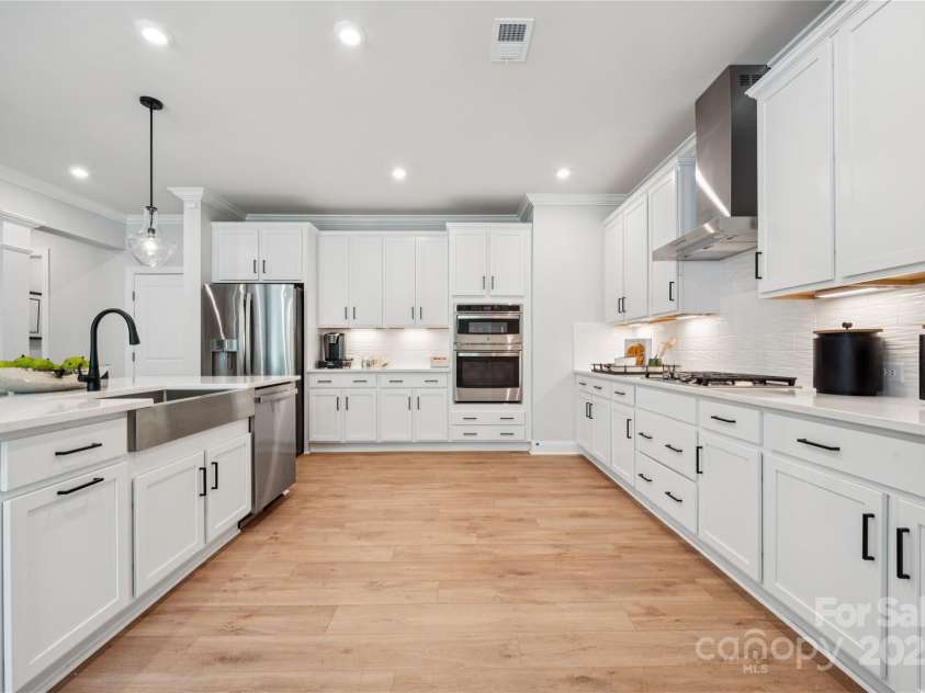 220 Coronado Avenue, Matthews, NC 28104.  MLS# CAR4289018, YatesRealty ID 30588. Example Photo