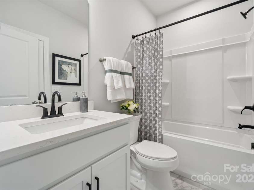 220 Coronado Avenue, Matthews, NC 28104.  MLS# CAR4289018, YatesRealty ID 30588. Example Photo
