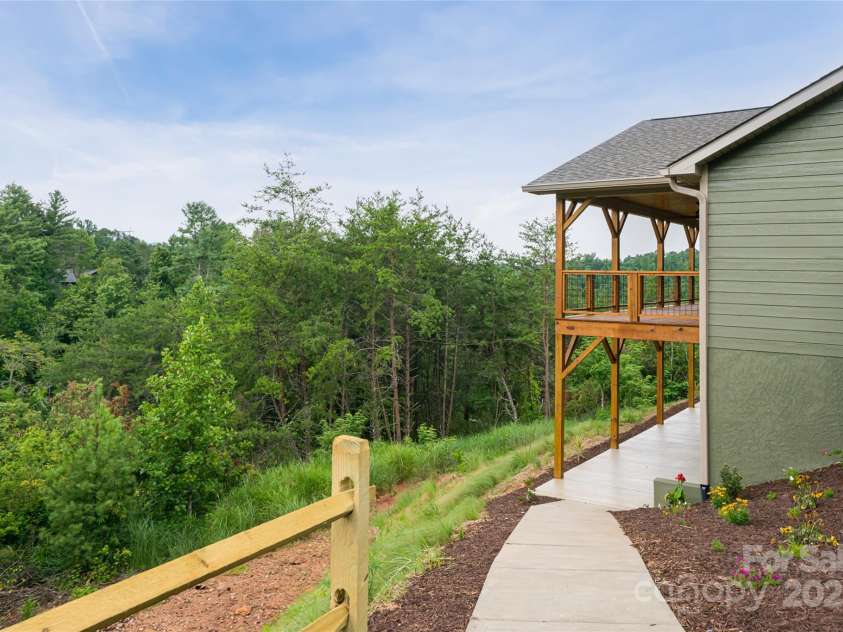 181 Flint Morgan Road, Mars Hill, NC 28754.  MLS# CAR4288459, YatesRealty ID 30594. Sidewalk access to covered patio