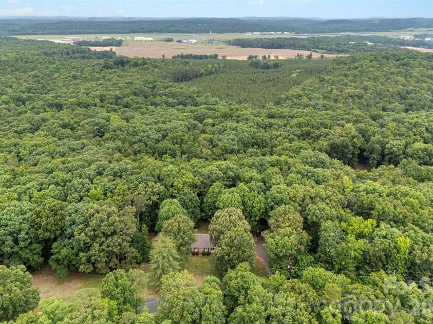 36183 Davis Drive, Albemarle, NC 28001.  MLS# CAR4391780, YatesRealty ID 30605. Over 4 acres!