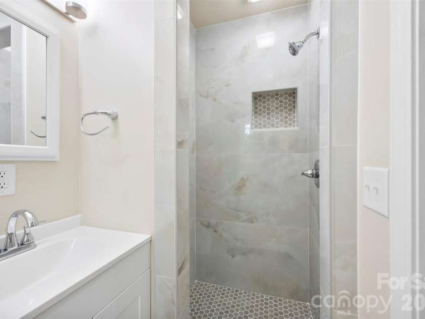 36183 Davis Drive, Albemarle, NC 28001.  MLS# CAR4391780, YatesRealty ID 30605. Primary Marble Shower