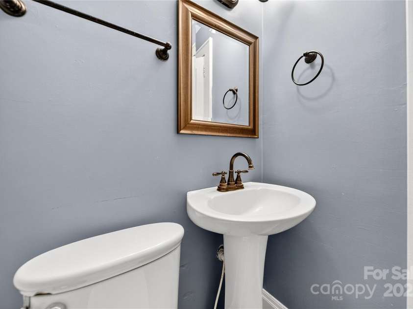 662 Carpenter Avenue, Mooresville, NC 28115.  MLS# CAR4286895, YatesRealty ID 30605. Commode and pedestal sink in only Bathroom
