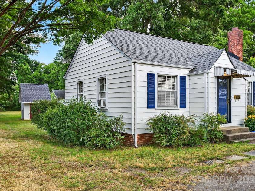 662 Carpenter Avenue, Mooresville, NC 28115.  MLS# CAR4286895, YatesRealty ID 30605. Large lot with storage outbuilding