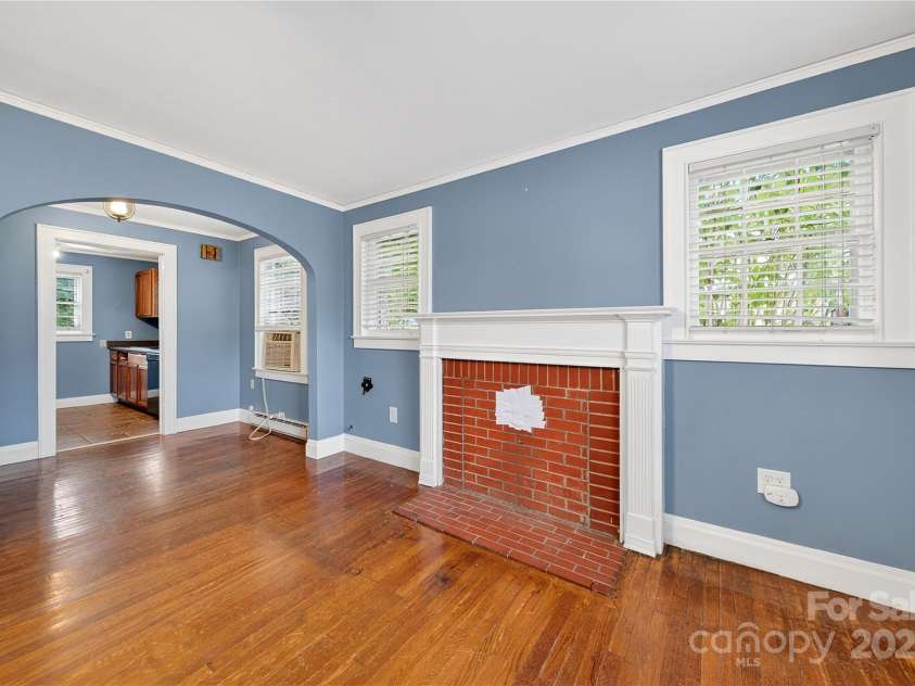 662 Carpenter Avenue, Mooresville, NC 28115.  MLS# CAR4286895, YatesRealty ID 30605. Living Room, Dining Room and Kitchen