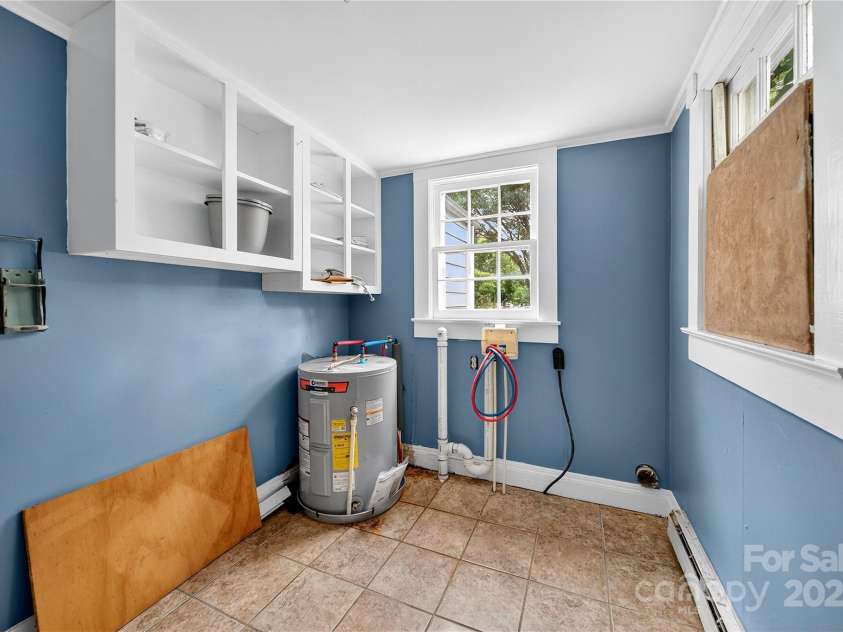 662 Carpenter Avenue, Mooresville, NC 28115.  MLS# CAR4286895, YatesRealty ID 30605. Utility Room off the Kitchen is also where the Laundry hook-ups are located