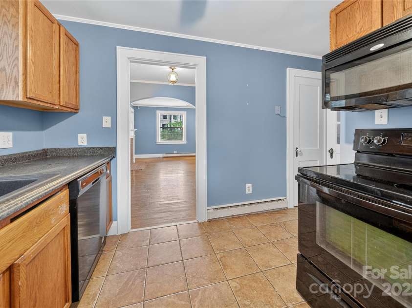 662 Carpenter Avenue, Mooresville, NC 28115.  MLS# CAR4286895, YatesRealty ID 30605. View from Kitchen back toward Living Room