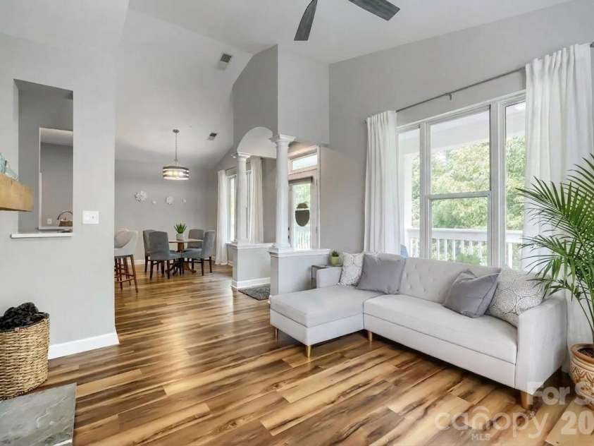 706 Northeast Drive, Davidson, NC 28036.  MLS# CAR4385734, YatesRealty ID 30606. Living room filled with natural light