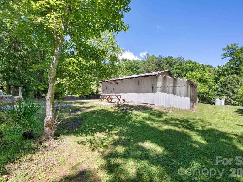 30 Reeves Drive, Burnsville, NC 28714.  MLS# CAR4391470, YatesRealty ID 30607. Back Of Garage