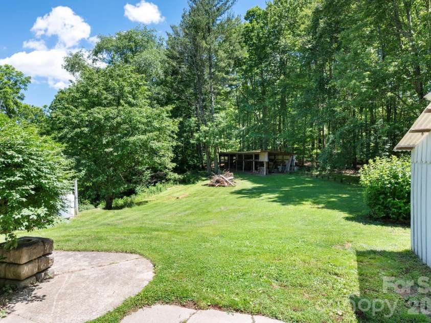30 Reeves Drive, Burnsville, NC 28714.  MLS# CAR4391470, YatesRealty ID 30607. Backyard