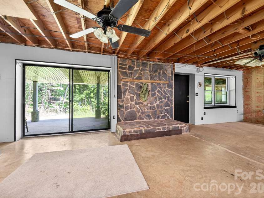 30 Reeves Drive, Burnsville, NC 28714.  MLS# CAR4391470, YatesRealty ID 30607. Basement Looking Out Back
