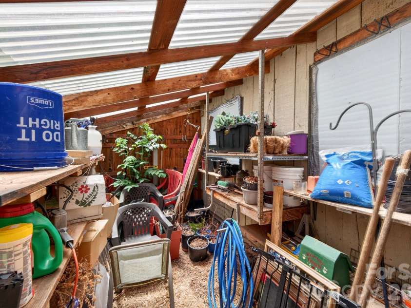 30 Reeves Drive, Burnsville, NC 28714.  MLS# CAR4391470, YatesRealty ID 30607. Garden Area On Back Of Garage