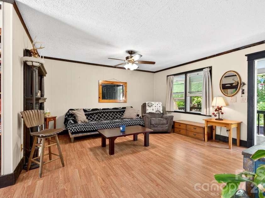 30 Reeves Drive, Burnsville, NC 28714.  MLS# CAR4391470, YatesRealty ID 30607. Living Room Looking To Front