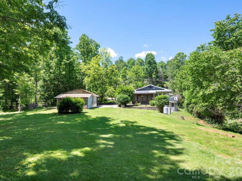 30 Reeves Drive, Burnsville, NC 28714.  MLS# CAR4391470, YatesRealty ID 30607. Yard Looking Toward House