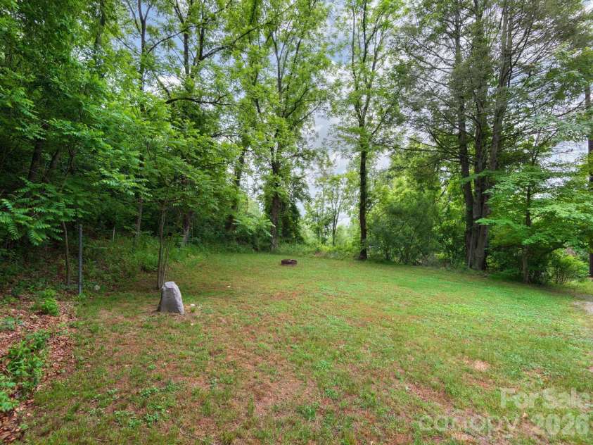 24 Piney Ridge Mountain Road, Zirconia, NC 28790.  MLS# CAR4382170, YatesRealty ID 30608. Expansive Yard