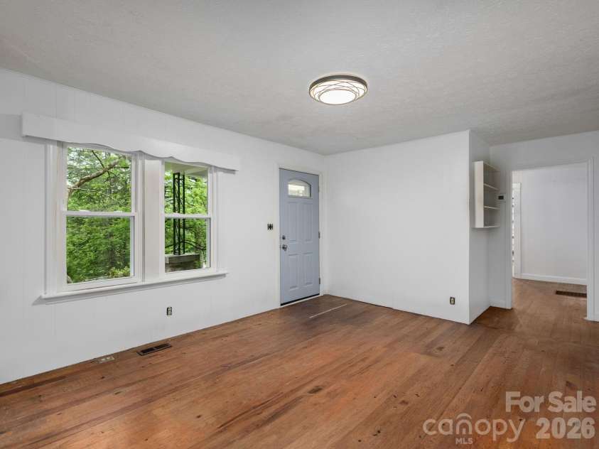 24 Piney Ridge Mountain Road, Zirconia, NC 28790.  MLS# CAR4382170, YatesRealty ID 30608. Gleaming Hardwoods
