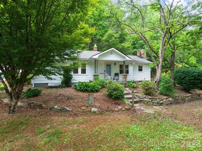 24 Piney Ridge Mountain Road, Zirconia, NC 28790.  MLS# CAR4382170, YatesRealty ID 30608. Mature Landsape