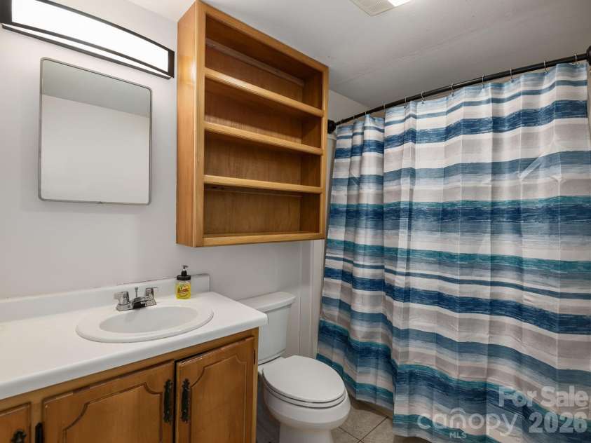 24 Piney Ridge Mountain Road, Zirconia, NC 28790.  MLS# CAR4382170, YatesRealty ID 30608. Spacious Bath