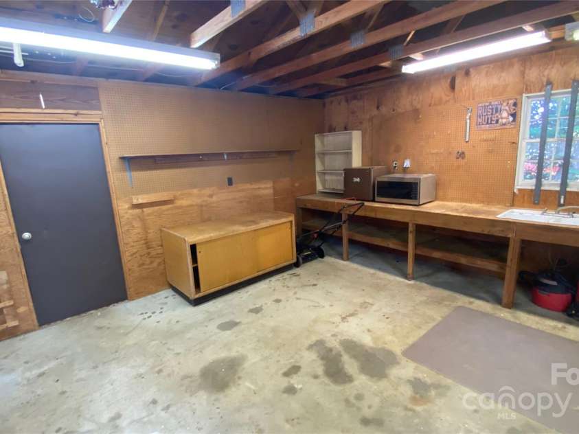 100 Ruby Lane, Gastonia, NC 28054.  MLS# CAR4284435, YatesRealty ID 30609. Door to Workshop from garage