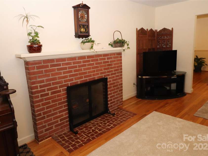 100 Ruby Lane, Gastonia, NC 28054.  MLS# CAR4284435, YatesRealty ID 30609. Living Room Fireplace