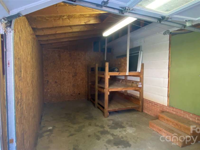 100 Ruby Lane, Gastonia, NC 28054.  MLS# CAR4284435, YatesRealty ID 30609. Workshop with a garage door on side