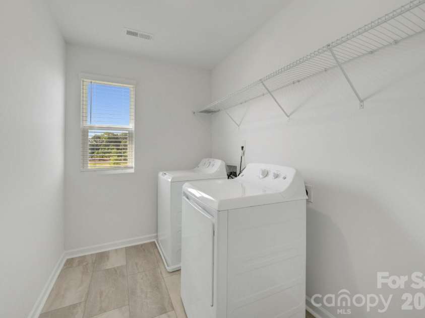 1354 Fremont Drive, Wingate, NC 28174.  MLS# CAR4391046, YatesRealty ID 30610. Laundry room